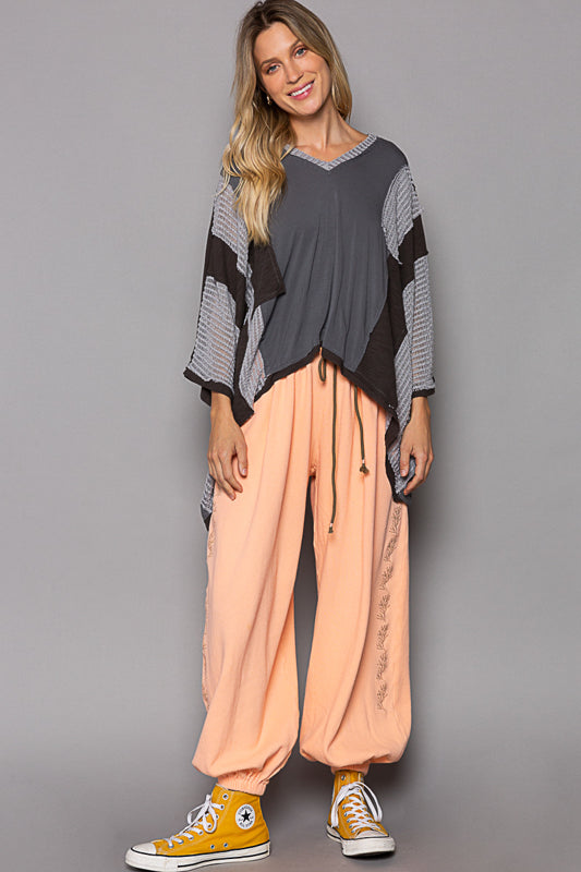 V-neck knit top, oversized fit, drop shoulder, see through fabric mixed, frayed edge detailing