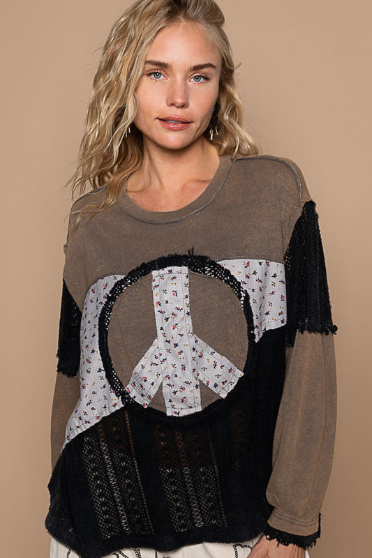 Oversized top with peace sign patch, lace patch, out seam detail, vintage washing.