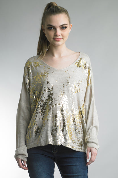 Women's lightweight v-neck sweater with metallic abstract print detail on front