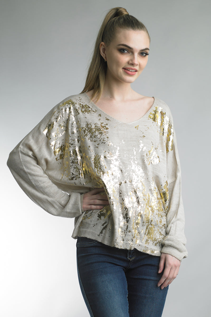 Women's lightweight v-neck sweater with metallic abstract print detail on front