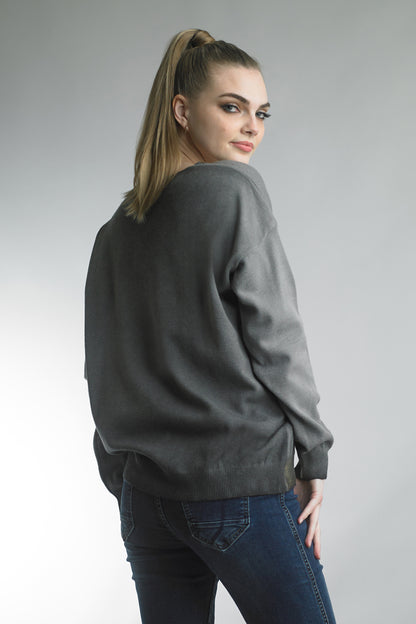 Women's lightweight v-neck sweater with metallic trim at neck and waist