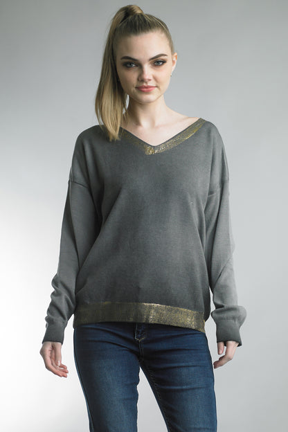 Women's lightweight v-neck sweater with metallic trim at neck and waist